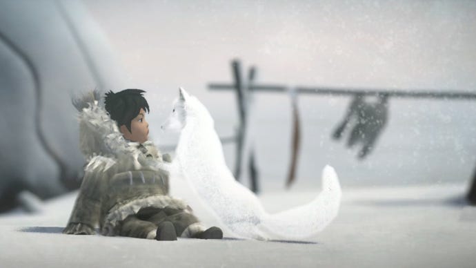 A small girl in indigenous clothing looks slightly surprised as a white fox presses up close to her face. The area around them is snowy, but seems to be part of a village.