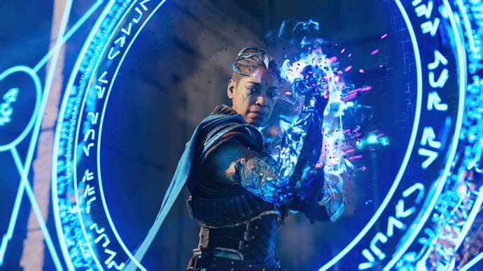 General Kirkan, played by Gina Torres, throwing up a blue magical shield in Immortals Of Aveum