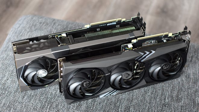An MSI-made RTX 4070 graphics card next to an MSI RTX 4070 Ti, for size comparison.