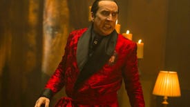 Nicholas Cage dressed in a red suit in Redfield