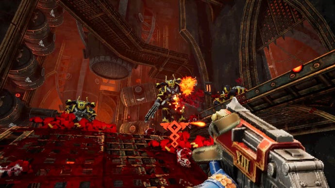 From a first-person perspective, a hulking Space Marine points a futuristic machine gun towards heavily armoured enemies within a gothic cathedral covered in blood red light